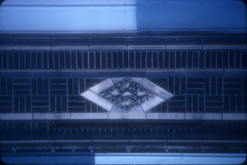 Terra cotta diamond panel from window spandrel.