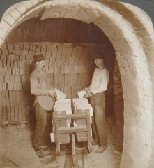 Removing brick from kiln after burning