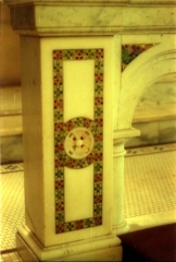 Communion railing end post detail.