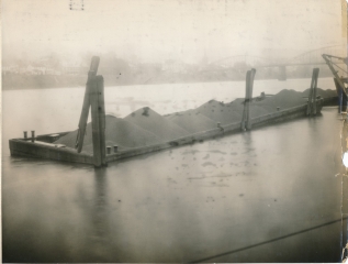 Barge carrying concrete mixture