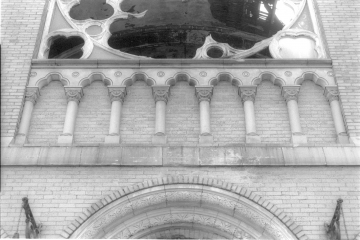 Blind terra cotta balustrade from above entrance.